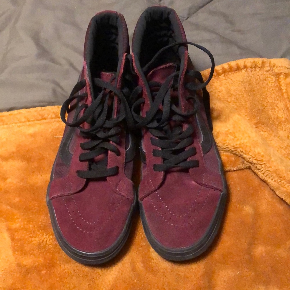 Maroon and black vans